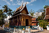 Wat Xieng Thong temple in Luang Prabang, Laos.  La Chapelle Rouge , the Red Chapel. It contains an especially rare reclining Buddha. 